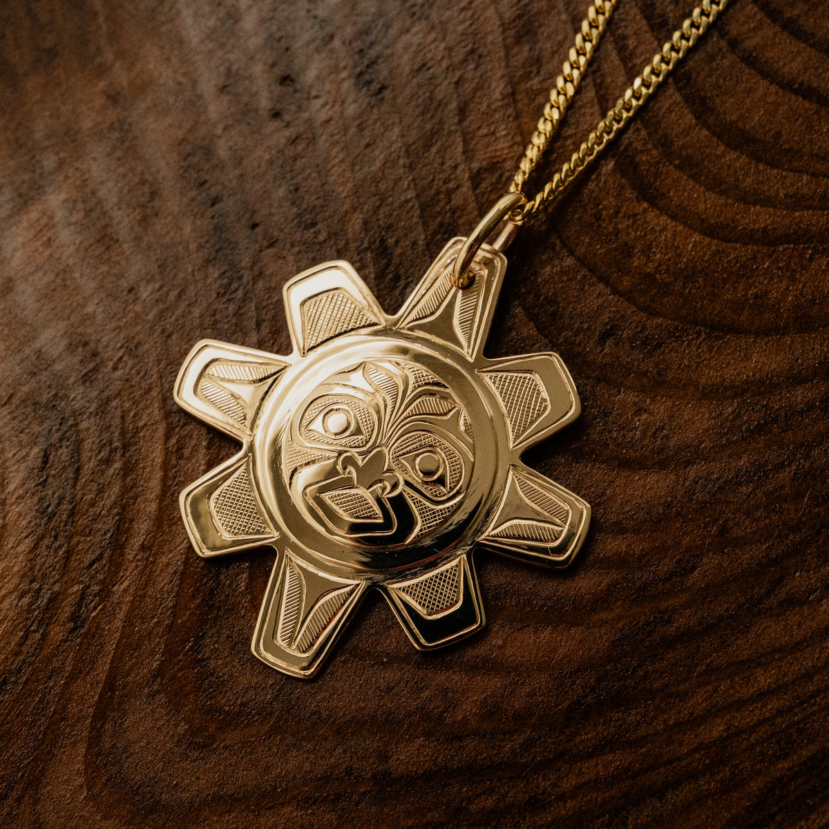 Gold Sun Pendant by Gitxsan artist, Meghan McRae