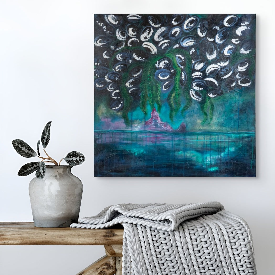 Abstract painting on a wall above a wooden bench with a vase and blanket.