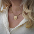 14K Gold Raven Pendant by James Sawyer (Haida)