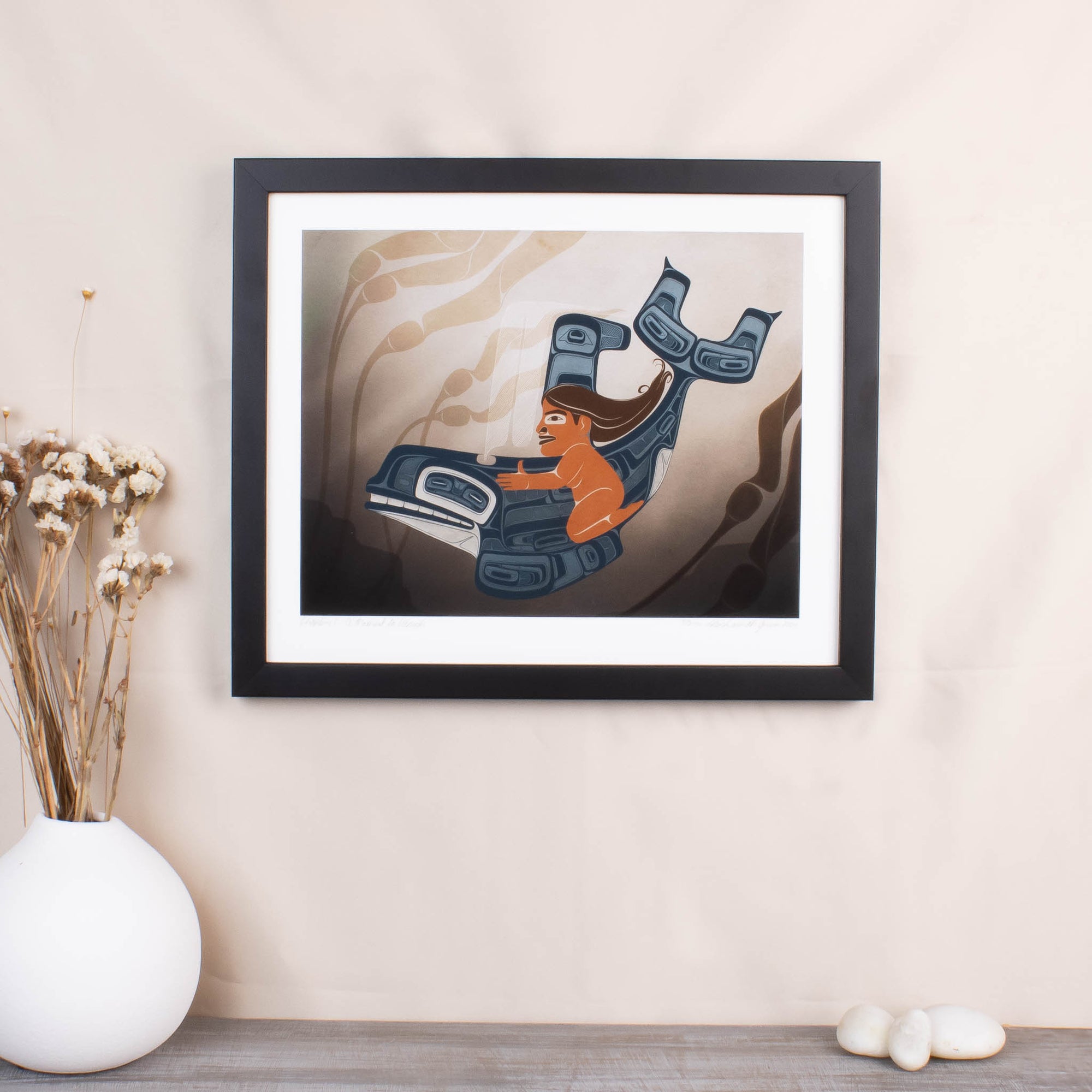 A Moment to Vanish fine art print in a black frame with grey desk and white vase