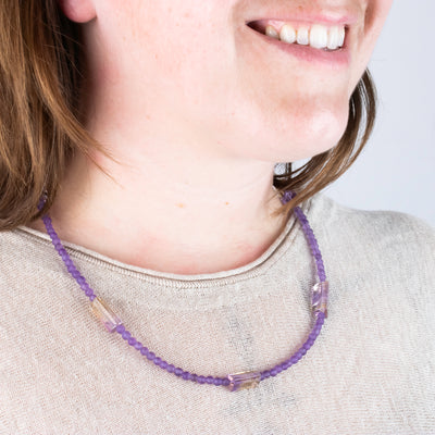 Beaded Amethyst Necklace with Faceted Bicolour Ametrine close up on model