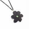 Hand Carved argillite flower Pendant with abalone inlay, made by Local Haida Gwaii artist amy edgars on a Italian sterling silver curb chain