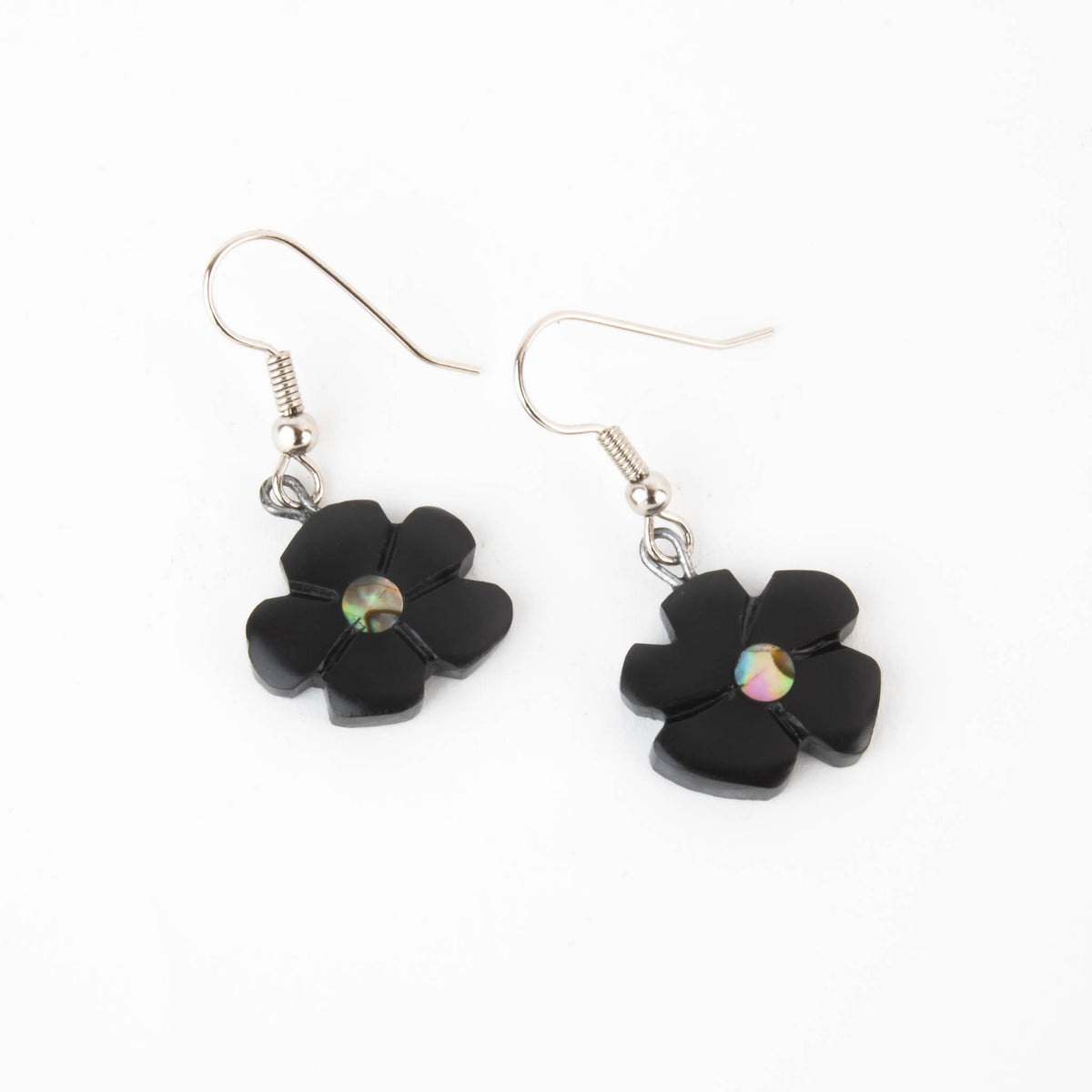 Hand carved Dainty Floral argillite with abalone inlay earrings. adding a fresh look to formline.