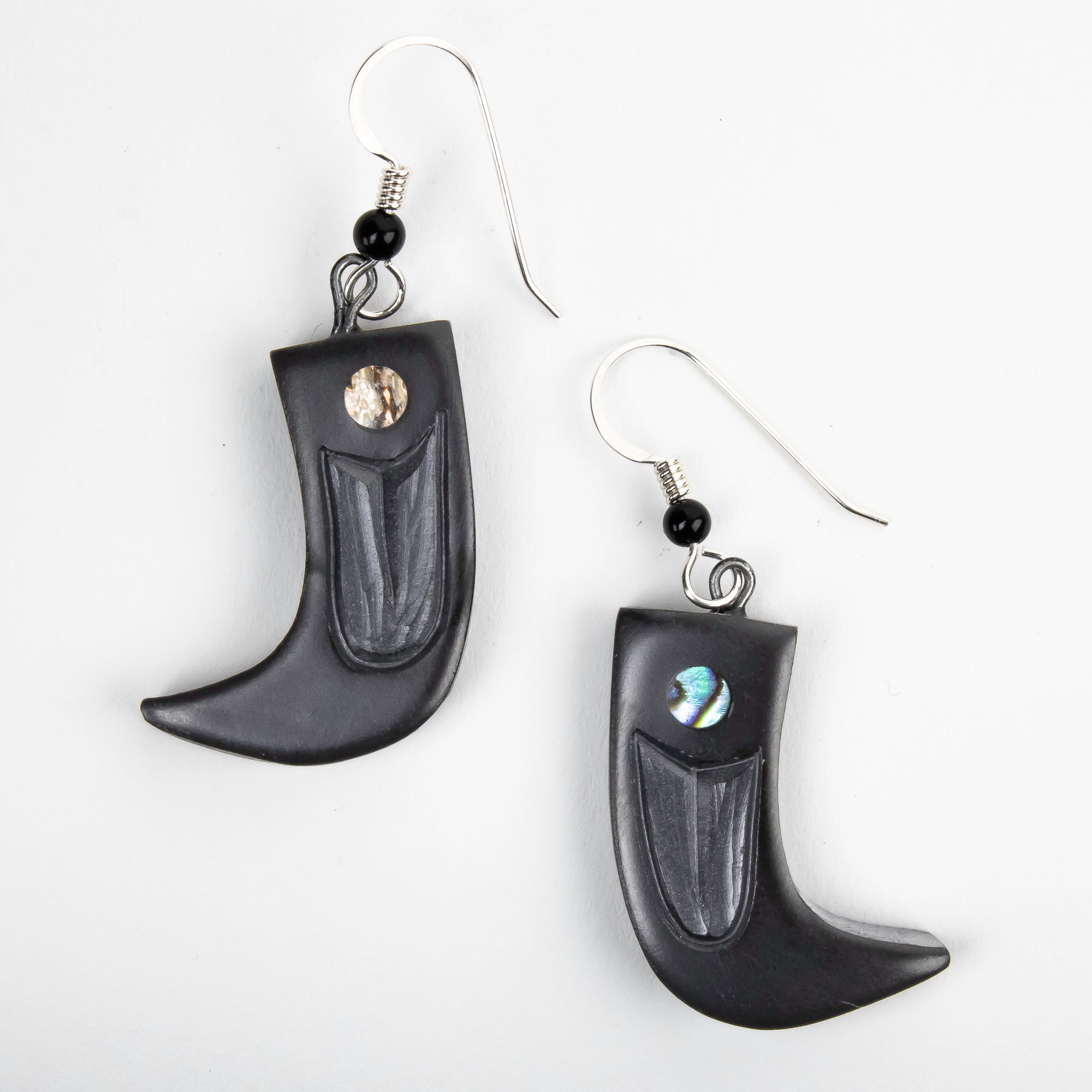 Large argillite bear claw earrings with abalone inlay, and  Shepard hooks with small black bead