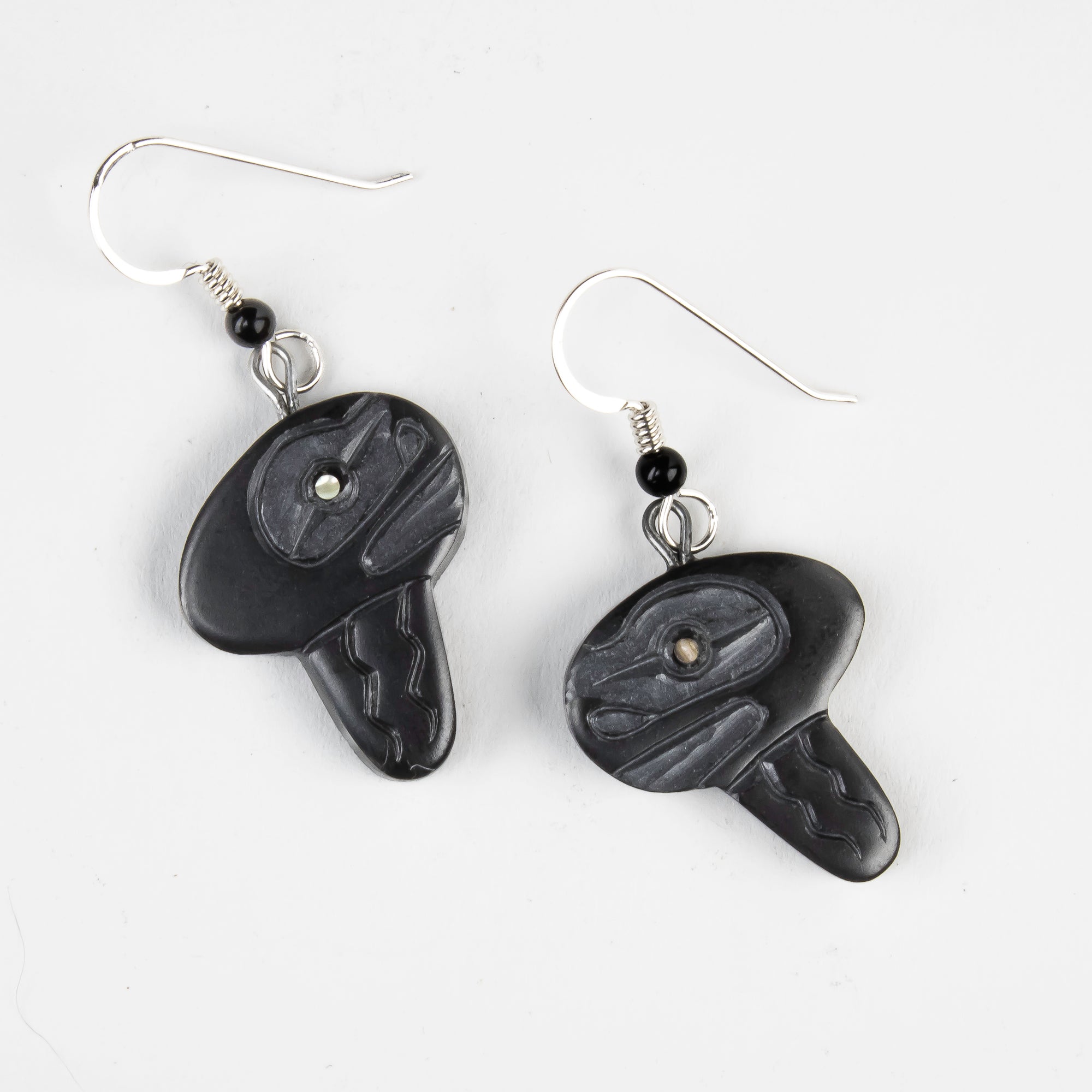 Argillite Jellyfish earrings with  abalone inlay, and Shepard hooks with small black bead