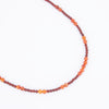 Photo showing of the necklace form of a Hand beaded deep red and orange Carnelian Agate Necklace with  sterling silver clasp