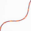 Carnelian Agate Necklace on white background arranged in a wave configuration