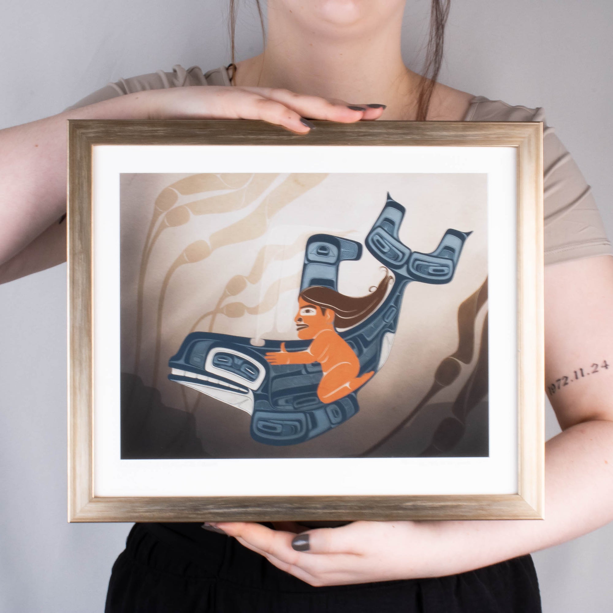 A moment to Vanish Chapter one. the first in a series and a gallery exclusive it features a women rinding through a kelp bed on an killer whale. In soft blues and browns: Framed in a brass frame with conservation glass