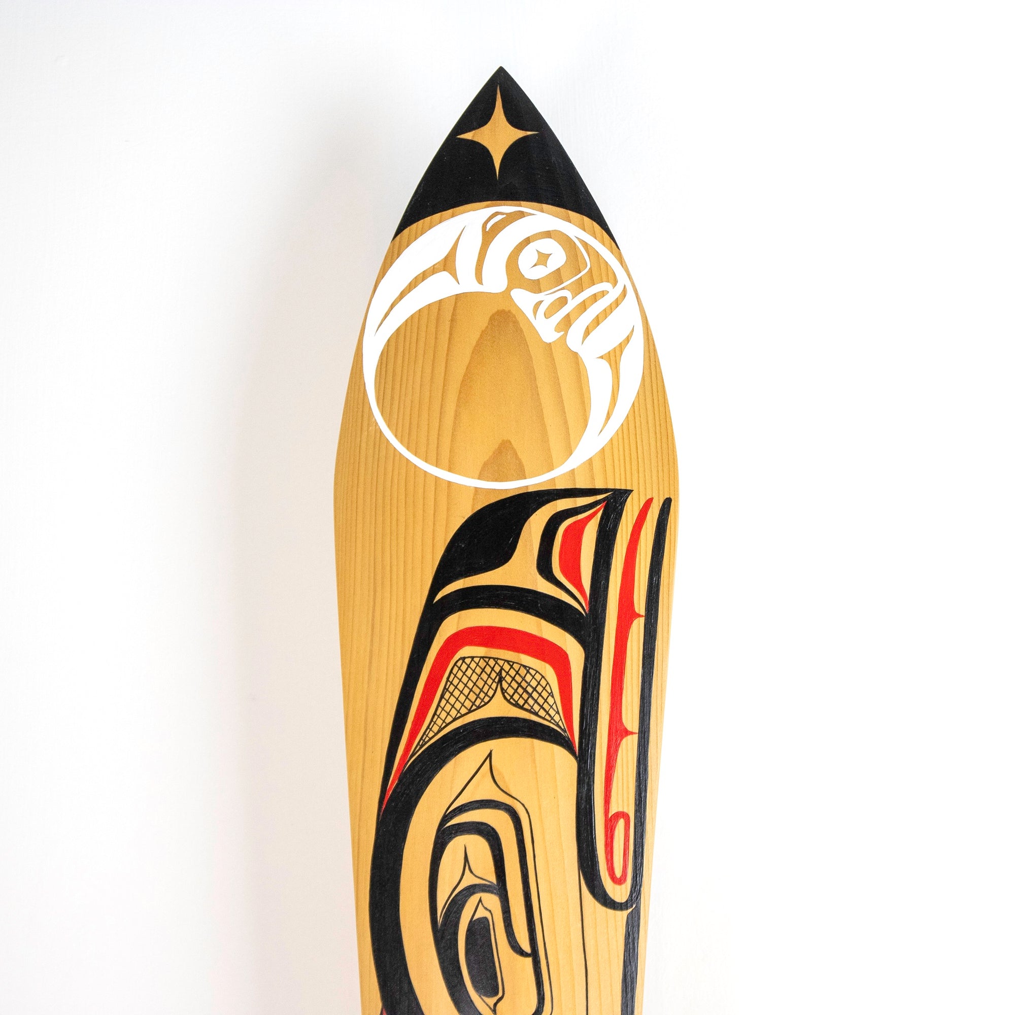 Close-up tip of wood paddle