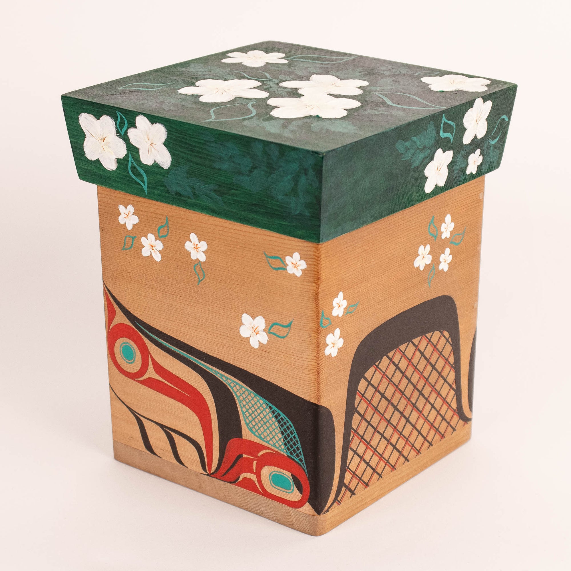 Wooden box with floral design and abstract animal illustration on a white background