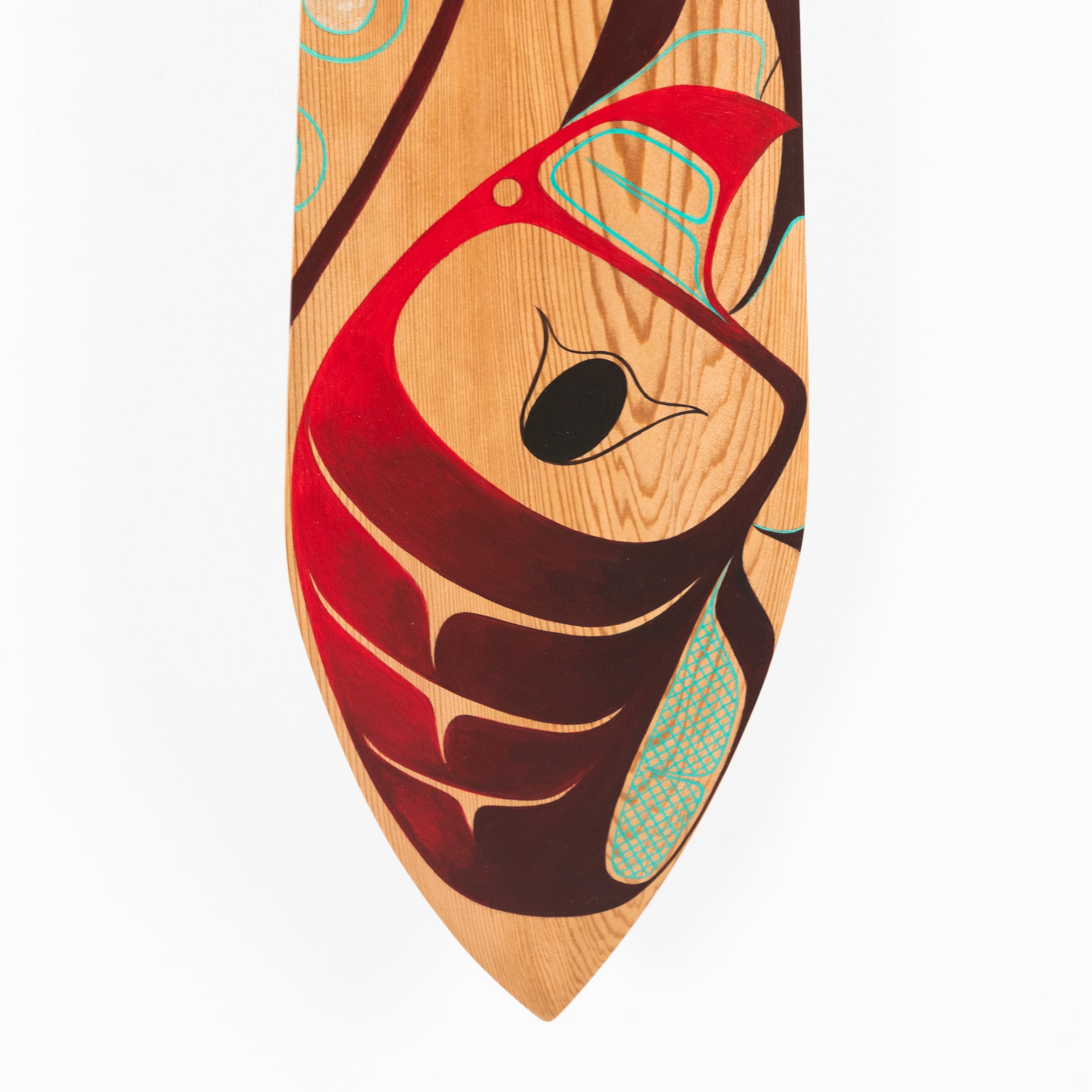 Close up of octopus face hand painted on a paddle