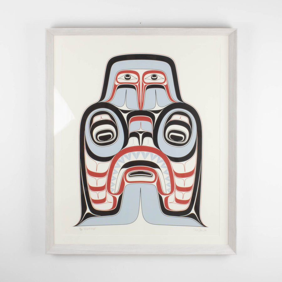 Haida Art print featuring supernatural being Dogfish mother. with bold red and black, and soft blue hues to show contrast, framed in a driftwood was frame