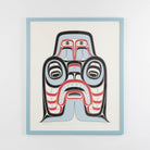 Haida Art print featuring a supernatural being, Dogfish mother. with bold red and black, and soft blue hues to show contrast, framed in a light blue frame.