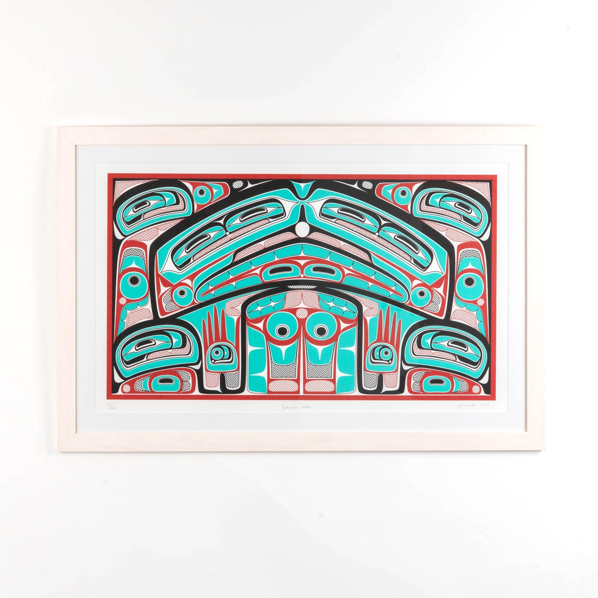 Colorful abstract formline chiefs chair design with geometric haida patterns  framed on a white background