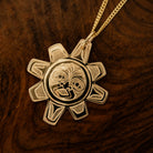 Gold Sun Pendant by Gitxsan artist, Meghan McRae