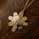 Gold Sun Pendant by Gitxsan artist, Meghan McRae