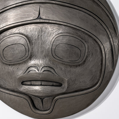 Close up of Fungus man mask castingby Haida artist Cori Savard on a white back ground