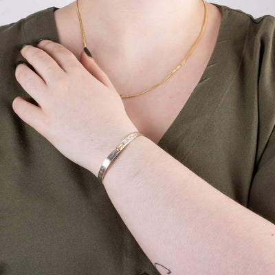 Sterling silver and gold nature inspired hummingbird bracelet by agnes seaweed wisden