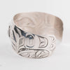Salmon view Sterling Silver cuff bracelet with intricate Eagle and Salmon Repoussé design