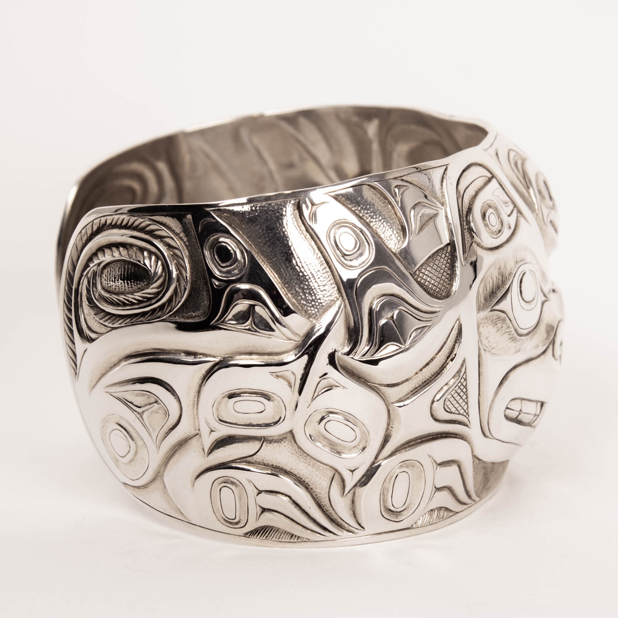 Sterling Silver Wasco and Killer Whale repousse Bracelet by master carver Jesse Brillon (Haida) right side