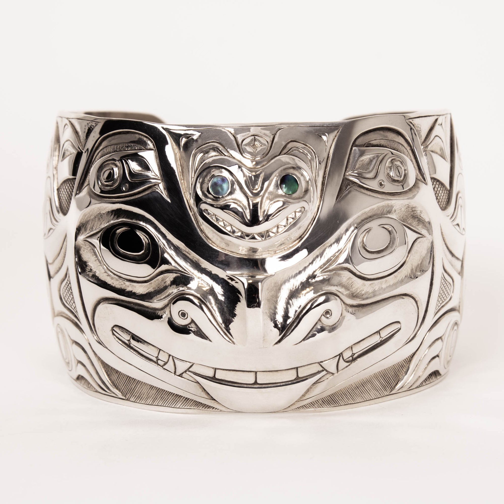 Sterling Silver Wasco and Killer Whale repousse Bracelet by master carver Jesse Brillon (Haida)
