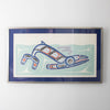 Humpback Whale Swimming in the ocean Northwest coast Indigenous art print by Canadian Indigenous Artist. Framed in metal frame with blue matting and conservation glass.