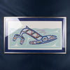 Blue whale framed artwork on a blue background