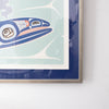 Close-up of the corner of a blue whale framed artwork