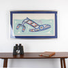Kun (whale) Fine art print, showcasing a whale swimming through the ocean in Haida Formline. Set in an Interior design
