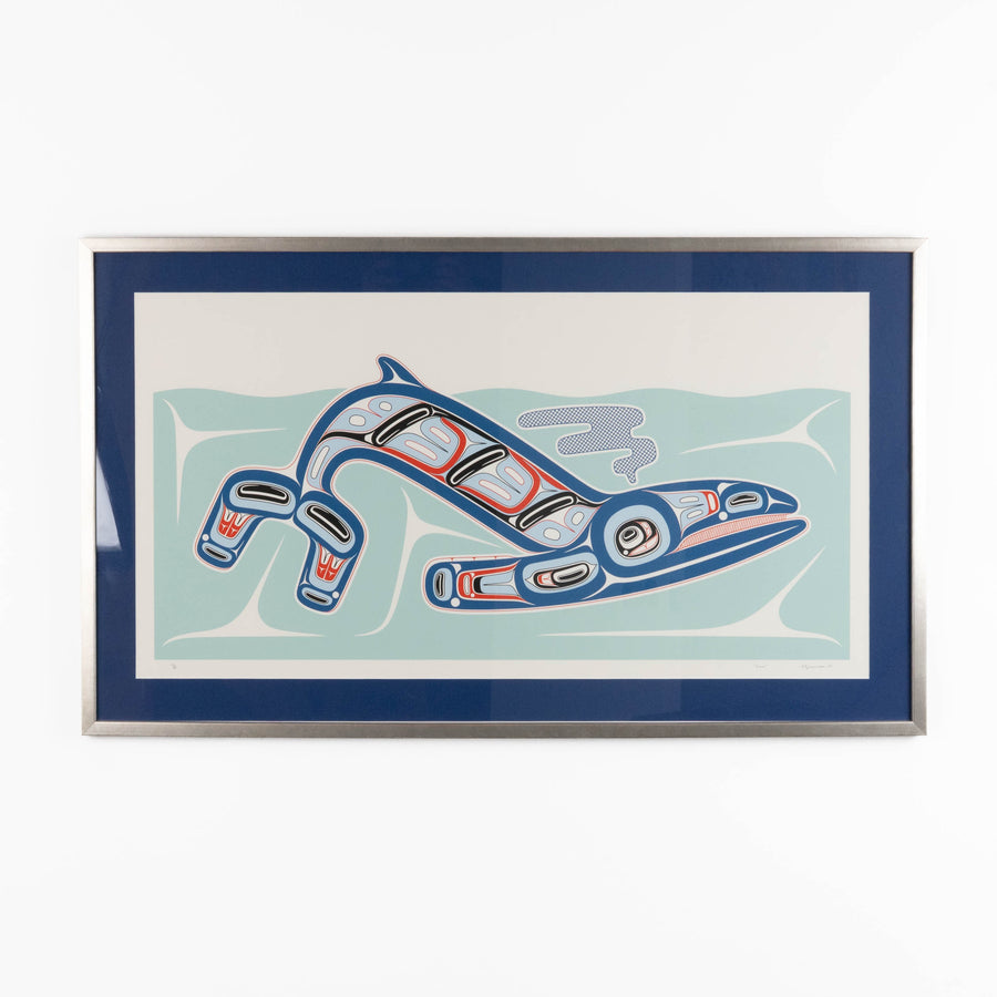 Framed artwork of a stylized Haida Formline Whale swimming through the water with abstract patterns on a white background