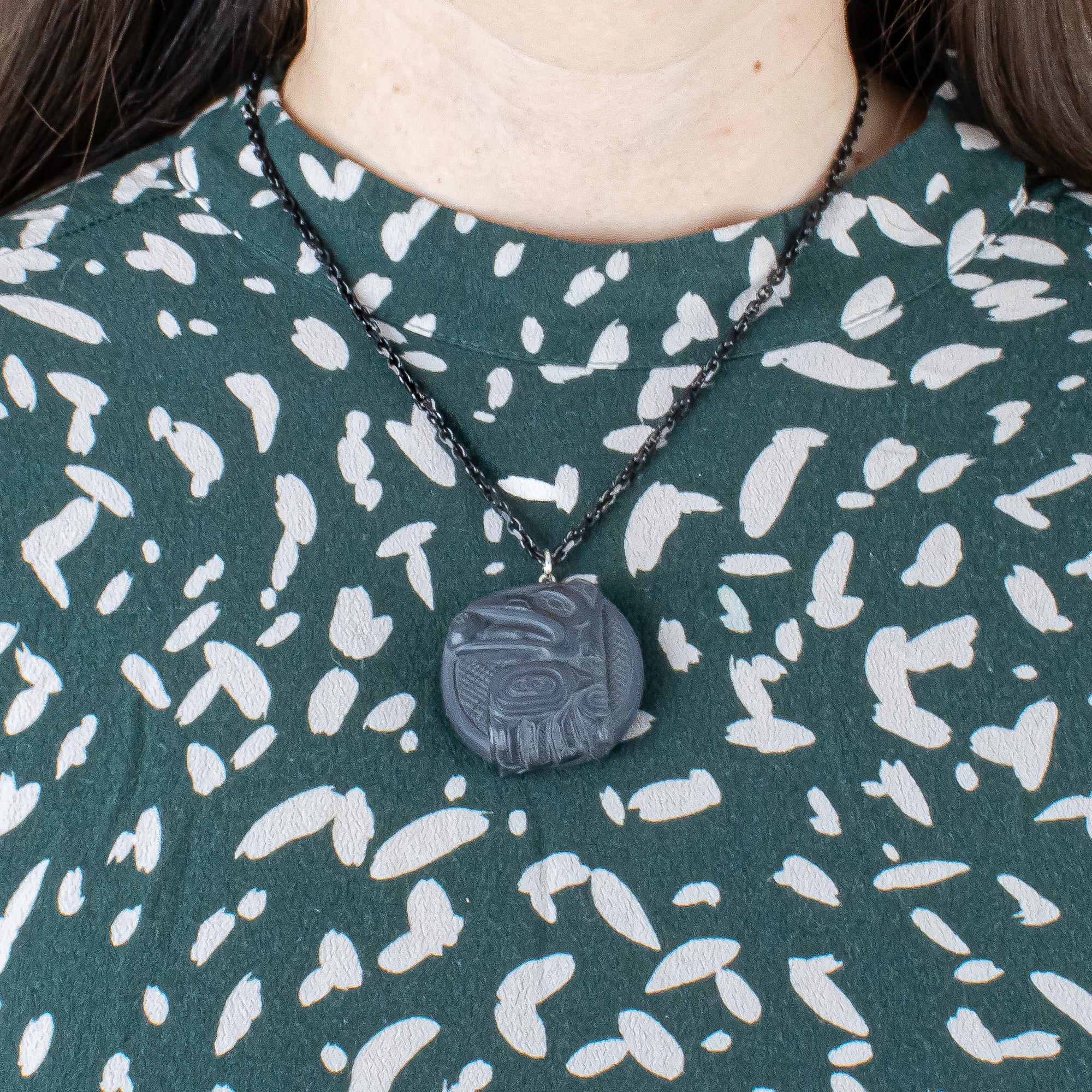 Argillite Raven Steals the light pendant on a model