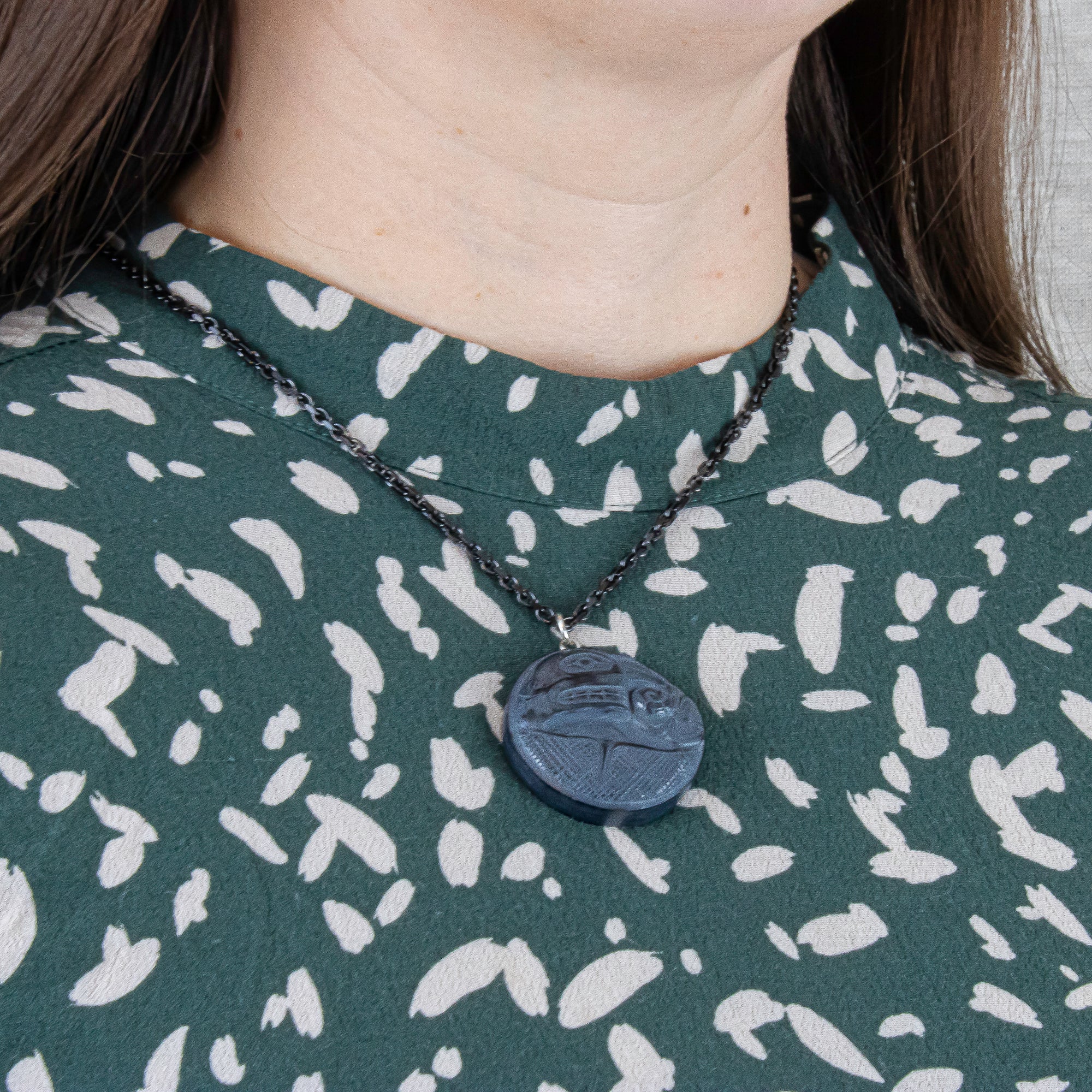 Hand carved Haida Argillite Butterfly pendant with flower by Local Haida Gwaii artist