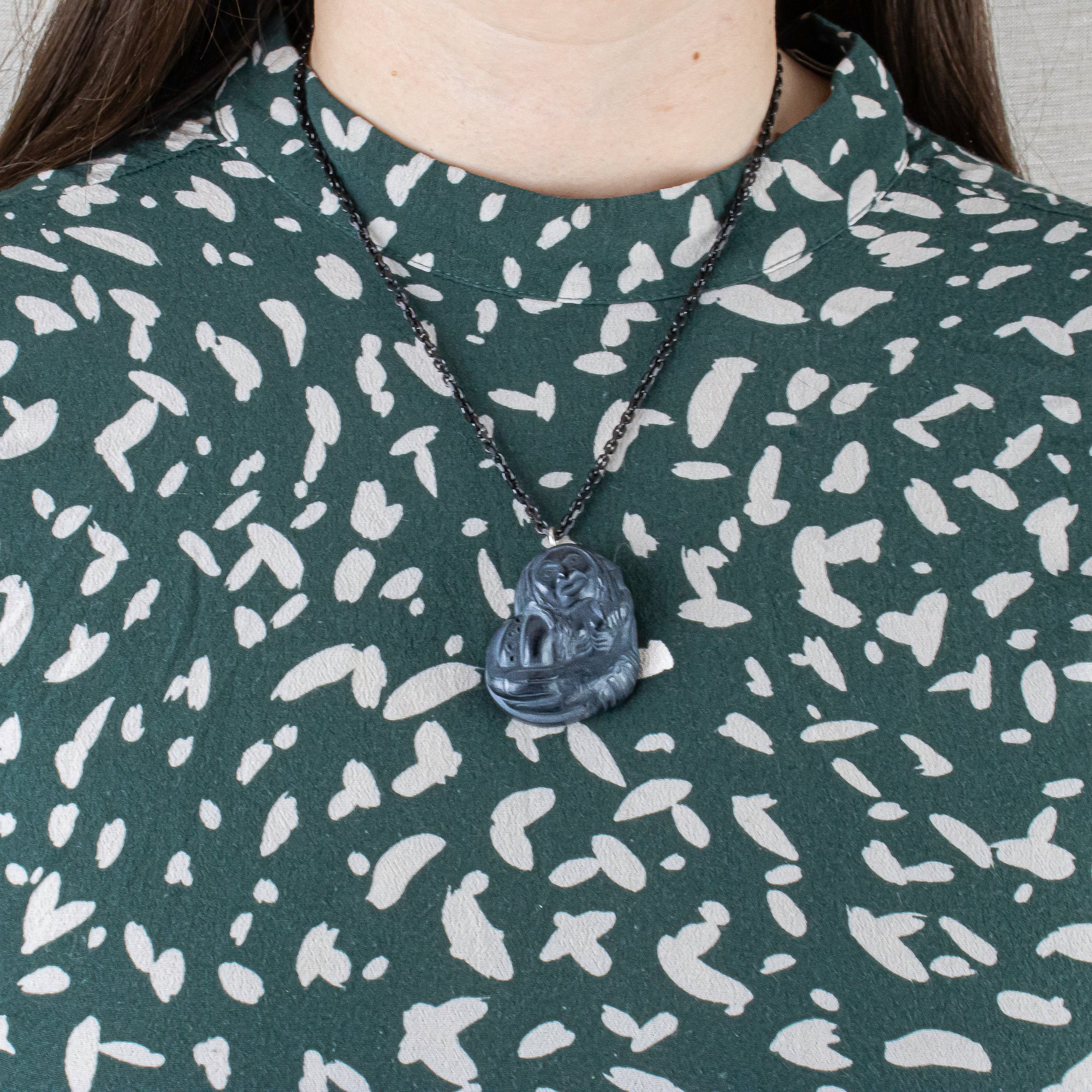 Octopus Women Argillite Pendant made by Canadian artist, worn by Model