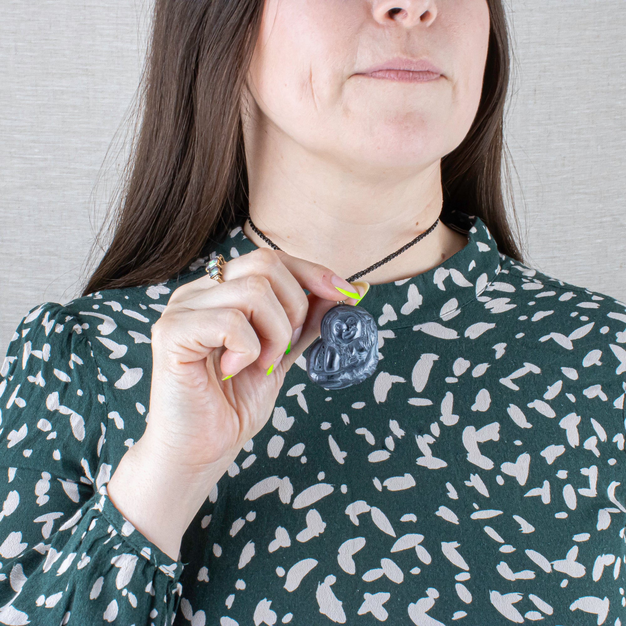 Octopus Women Argillite Pendant made by Canadian artist, worn by Model