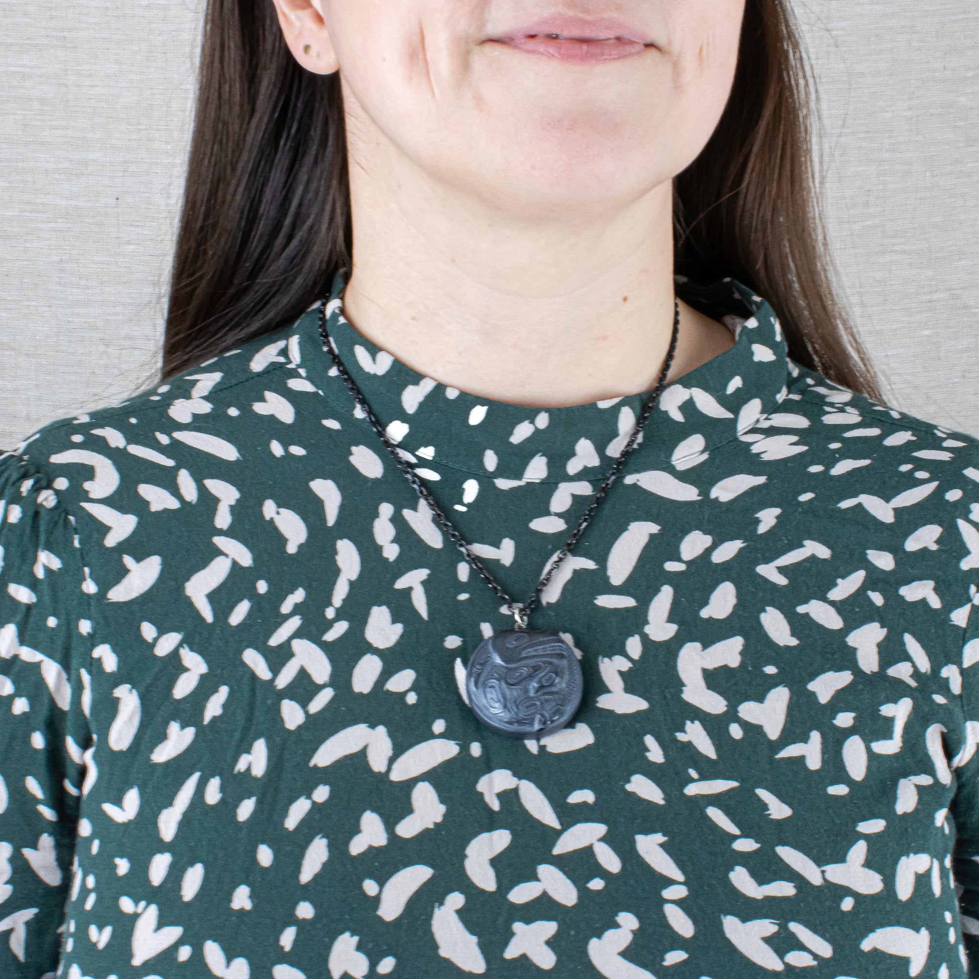 Argillite Mountain Goat Pendant hand carved from natural stone