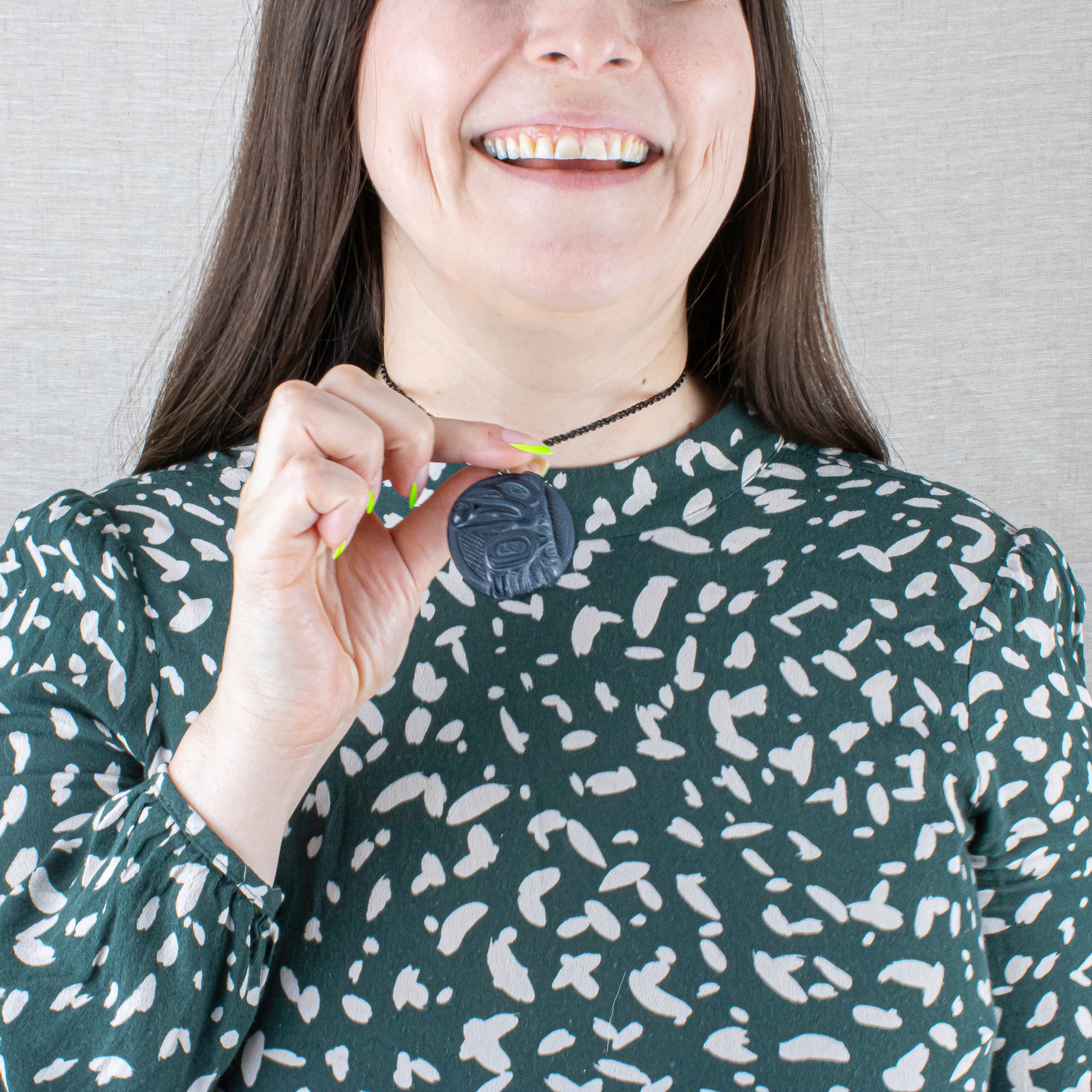 Argillite Raven Steals the light pendant on a model