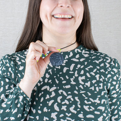 Argillite Raven Steals the light pendant on a model