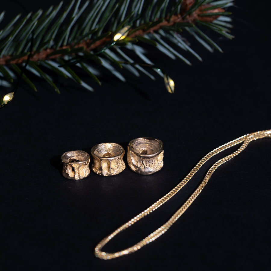 10K Gold Salmon Bone Vertebrae Pendant | By Morgan Asoyuf (Ts'msyen)