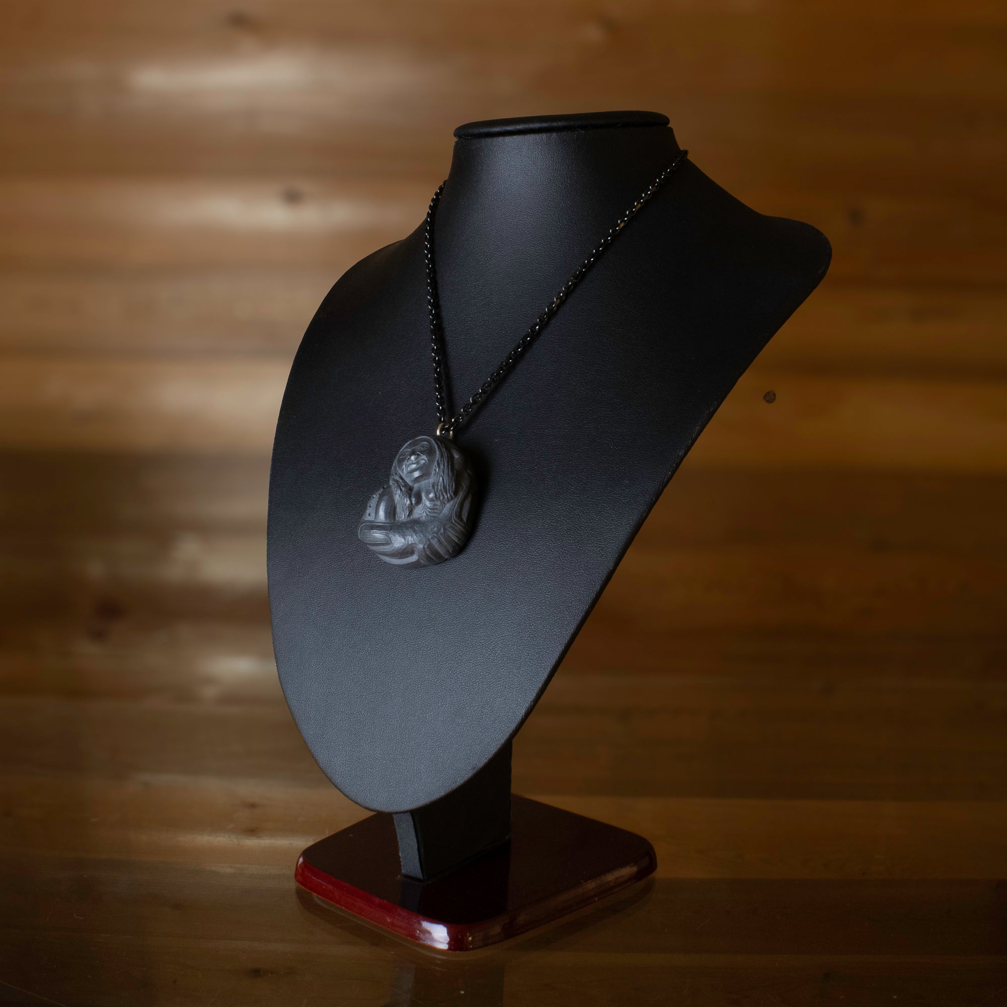 Octopus Women Argillite Pendant made by Canadian artist, worn by Model