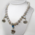 Freshwater Pearl Necklace with Sterling Silver Clamshells, Salmon Bone Vertebrae, Faceted Moonstone, Blue Topaz & Diamond