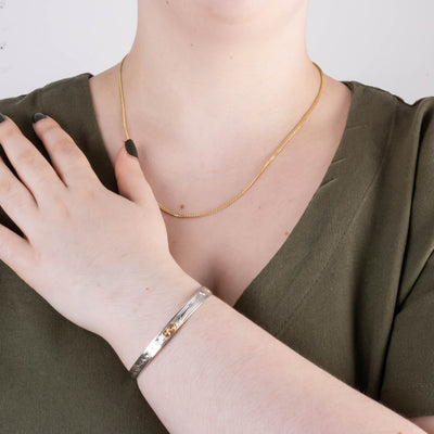Sterling silver and gold nature inspired raven bracelet by agnes seaweed wisden