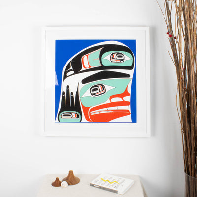 Reg Davidson Three Finned art print, framed in a white frame, displayed in a room.