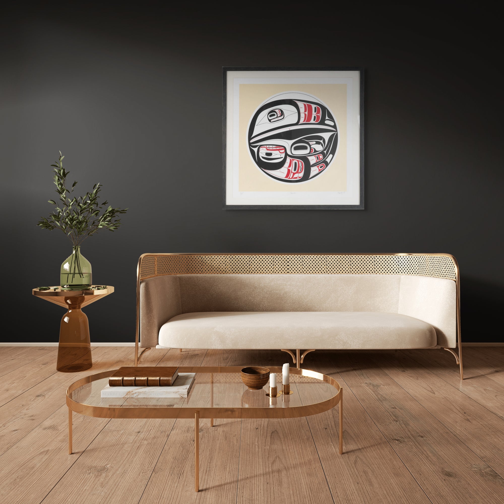 Modern living room with a beige sofa, coffee table, side table, and decorative Haida formline wall art.