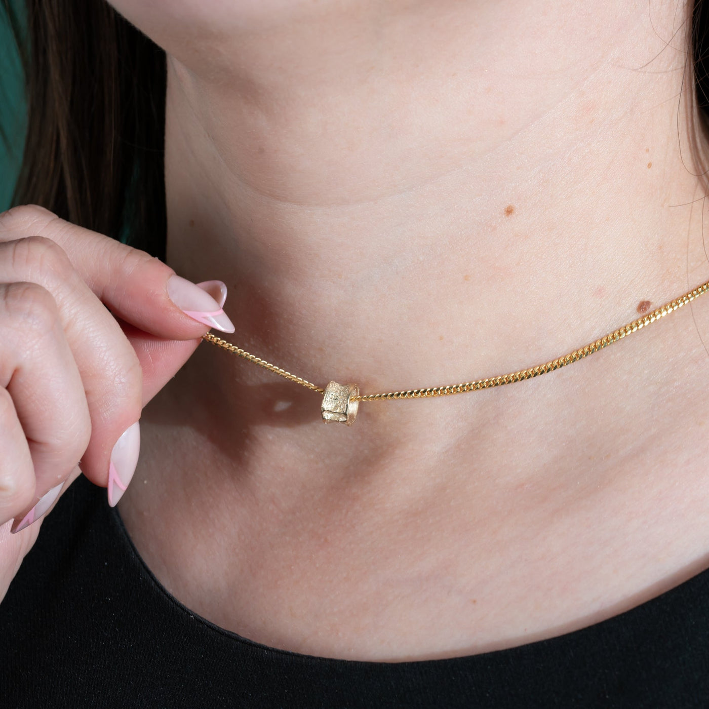 10K Gold Salmon Bone Vertebrae Pendant | By Morgan Asoyuf (Ts'msyen)