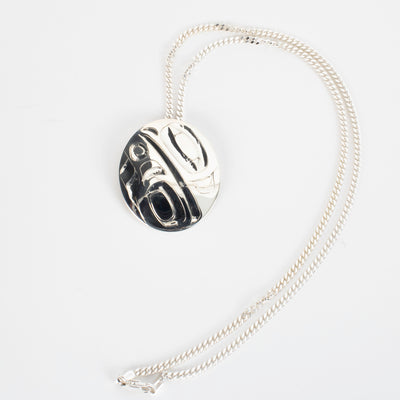 Haida Carver and Jeweller Alvin Adkins Sterling Silver Raven Pendant with 3mm curb chain