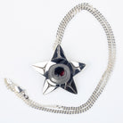 Sterling Silver Starfish Pendant by Canadian Handpoke tattoo artist Danika Saunders with a 3mm curb chain