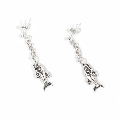 Angled Sterling Silver Stud Earrings with chain dangles and a NOrthwest Coast style salmon charm on a white back ground by Ts'msyen artist Morgan Asoyuf