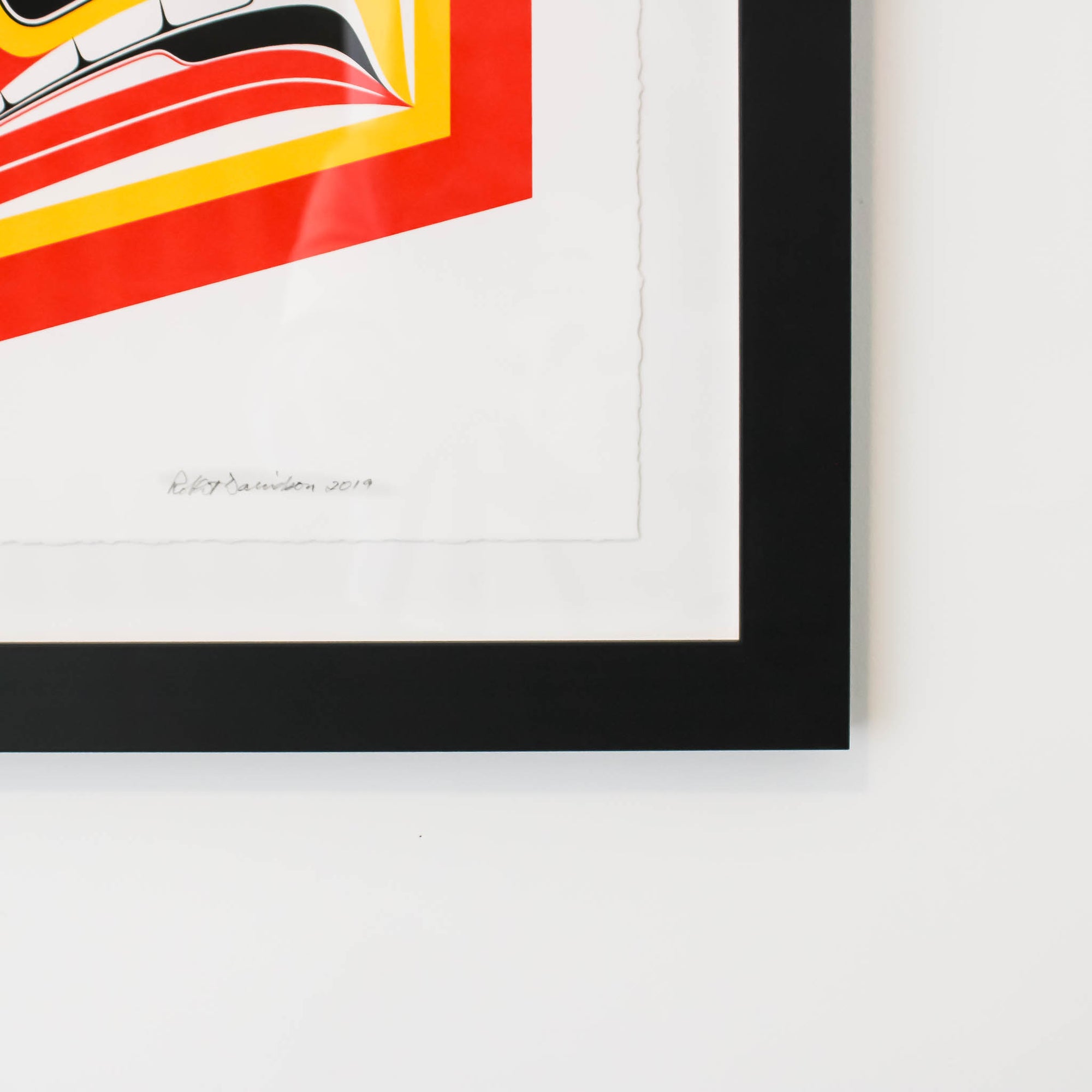 Showing hand written original signature and date of world famous artist Haida Robert Davidson, and the framing style his abstract print is in.