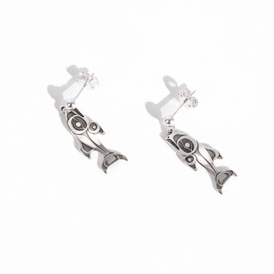 Sterling Silver Salmon earrings on a white background by Native artist Morgan Asoyuf