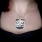 Sterling Silver Mouse Women Pendant by Canadian Handpoke tattoo artist Danika worn by a model
